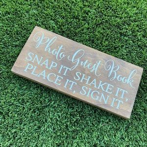 Wooden wedding guestbook sign.